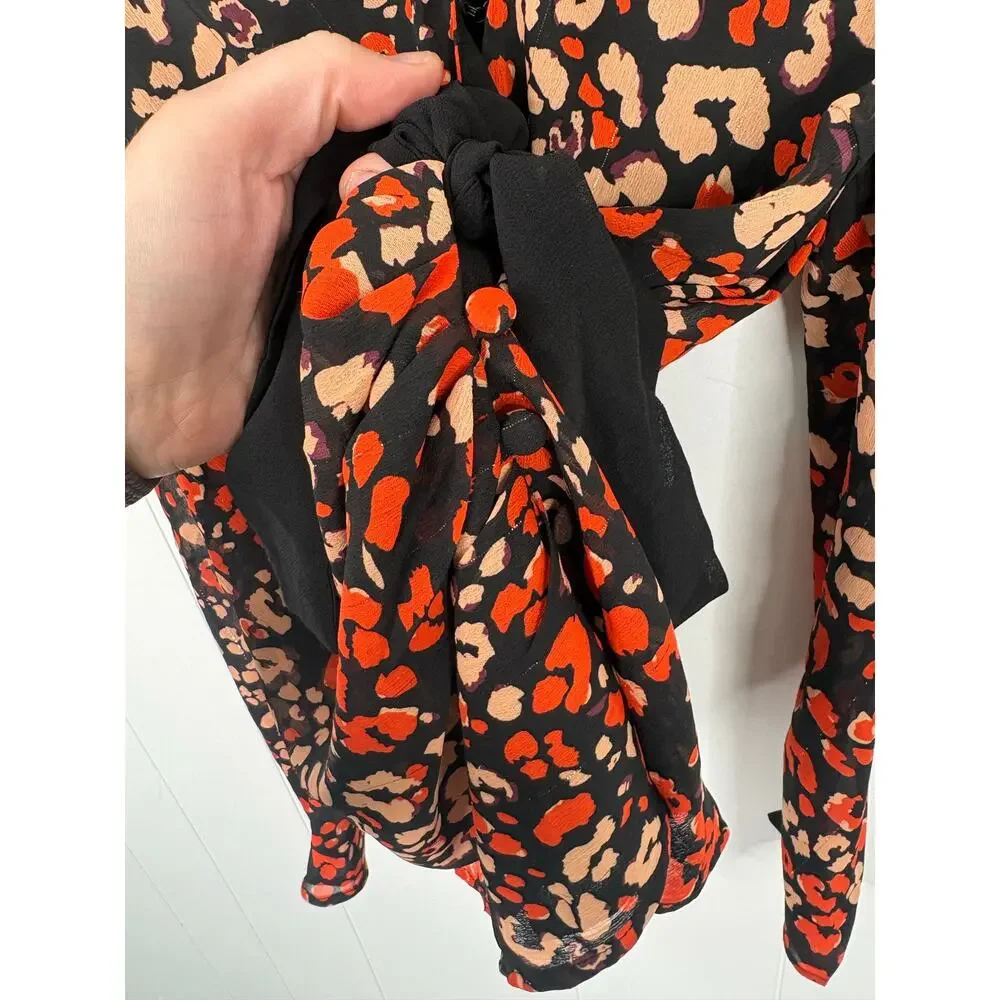 ASTR The Label Lissa Leopard Wrap Top XS Puff Sleeve Orange Black Tie Side